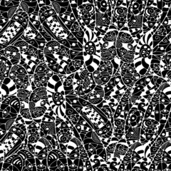 Seamless abstract hand-drawn  leaves pattern. ..Black and white. © zubas