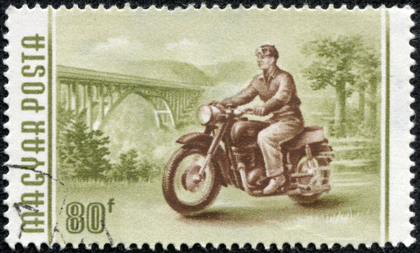 stamp printed in Hungary shows image of a motorcyclist