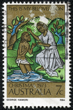 stamp printed in Australia,shows the Baptism of Christ