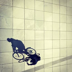 Zelfklevend Fotobehang Cycling man and his shadow in Berlin © christianmutter
