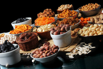 Nuts family on dark background