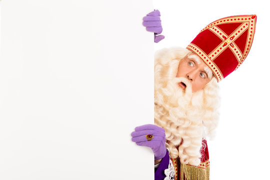 Sinterklaas looking on advertisement