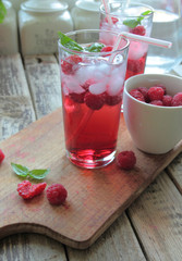 Cold rasberries drink with fresh fruits
