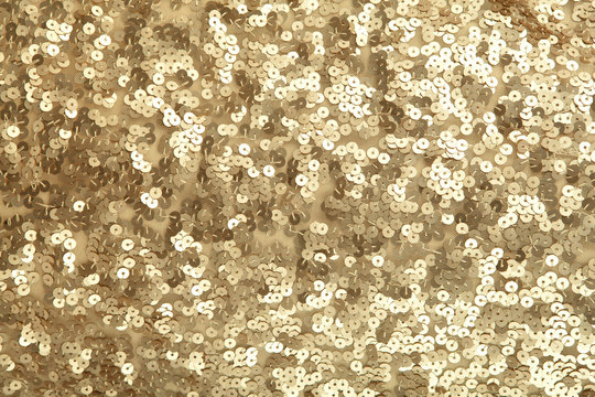 Golden sequins - sparkling sequined textile