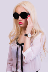 Pretty blonde girl with sunglasses