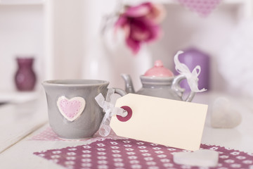 Teetasse mit Anhänger
