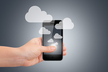 Hand Holding Smart Phone with Cloud Icons
