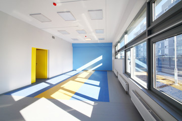 Group room with blue and white walls and windows