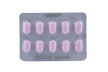 Long shape of pink tablet in blister pack