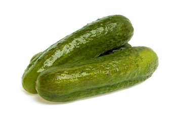 Pickled cucumbers on white background