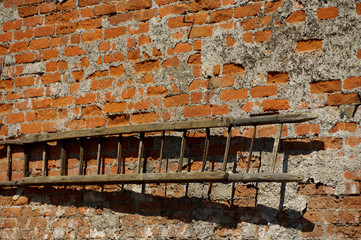 old timber ladders on wall 2