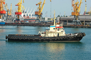 Tugboat in harbor quayside on Odessa, Ukraine