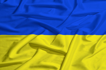 Flag of Ukraine on silk drape