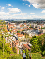 Panoramic view of a city with mountains in the back