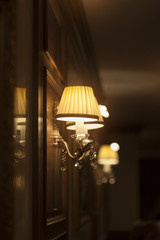 beautiful wall lamp in hotel. Turn on.