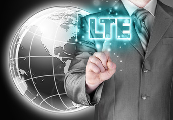 businessman is pushing his finger on lte button