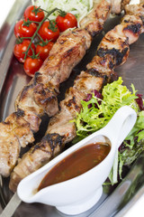 kebab meat sauce and salad vegetables