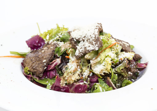 Warm salad of beef and vegetables in a restaurant