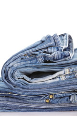Lot of different blue jeans close - up