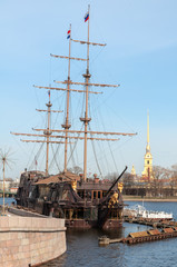 Fototapeta na wymiar Sailing Ship Against The Peter And Paul Fortress