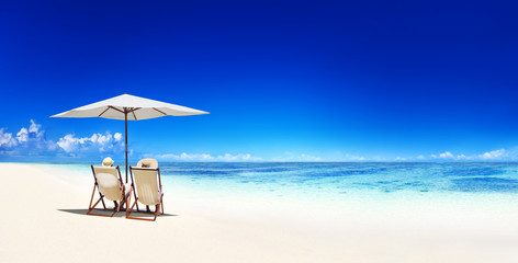 Couple Relaxing on the Tropical Beach