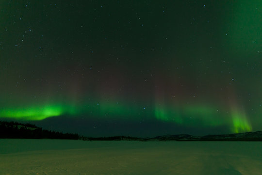 Nightsky Aurora borealis frozen Lake Laberge Yukon