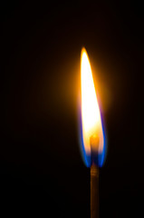 Silhouette of a burning match