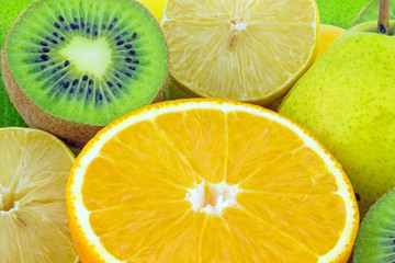 Multicolored background of fresh fruits