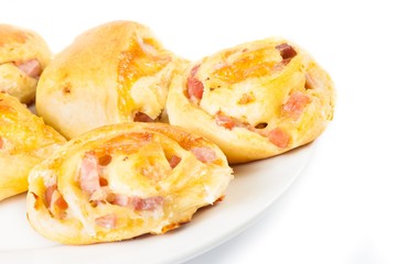 great breads with cubed bacon on white table