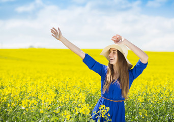 Girl in colza field