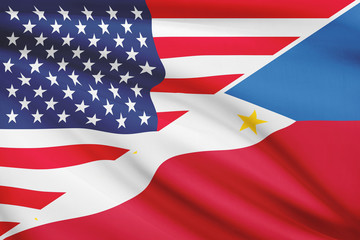 Series of ruffled flags. USA and Republic of the Philippines.