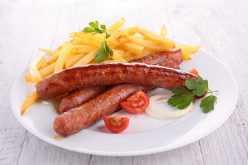 grilled sausage and french fries