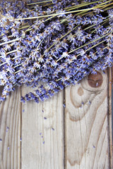 Lavender flowers on the wooden background