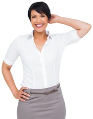 Fototapeta premium Thoughtful brown haired businesswoman in skirt