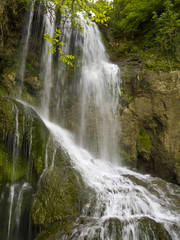 Fototapeta na wymiar Waterfall near the beautiful village Krushuna in Bulgaria