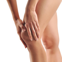 Woman having knee pain isolated on a white background