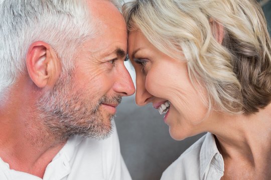 Close-up Of A Mature Couple With Head To Head