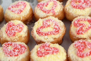 A lot of donut and strawberry jam