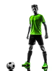 Poster soccer football player young man standing defiance silhouette © snaptitude