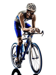 man triathlon iron man athlete cyclists bicycling - obrazy, fototapety, plakaty