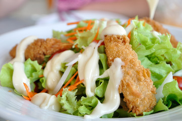 Vegetables salad with fried shrimps.
