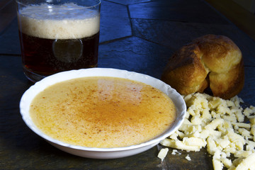 Beer Cheese Soup with Crumbled Cheese and Popover