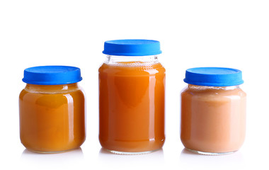 Baby food in glass jars, isolated on white