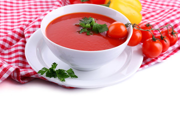 Tasty tomato soup and vegetables, isolated on white