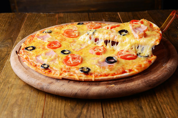 Tasty pizza on table close-up