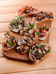 Delicious bruschetta with mushrooms