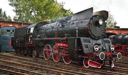 Fototapeta na wymiar vintage black steam powered railway train
