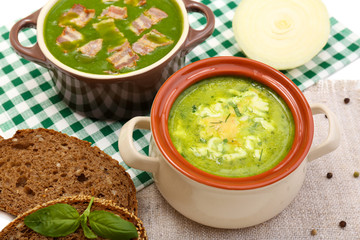 Tasty soup in saucepans, close up