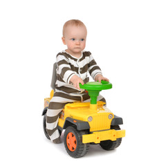 Infant child baby boy toddler happy driving big toy car truck