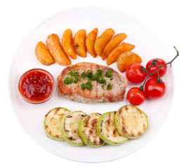 Grilled steak and grilled vegetables on plate, isolated on